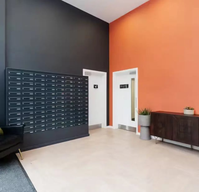 Mailboxes doors and a cabinet entrance area at Zinc Quarter in Bristol Student Accommodation