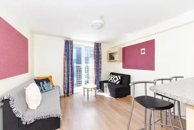 Sofa two cushions table and stools living room at Portsburgh Court in Edinburgh Student Accommodation