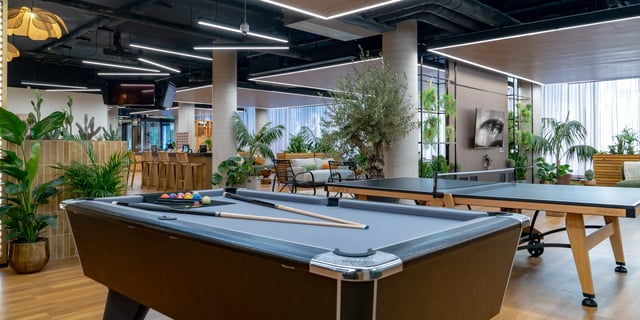Pool table ping pong table and seating area communal space at Canvas Manchester in Manchester Student Accommodation