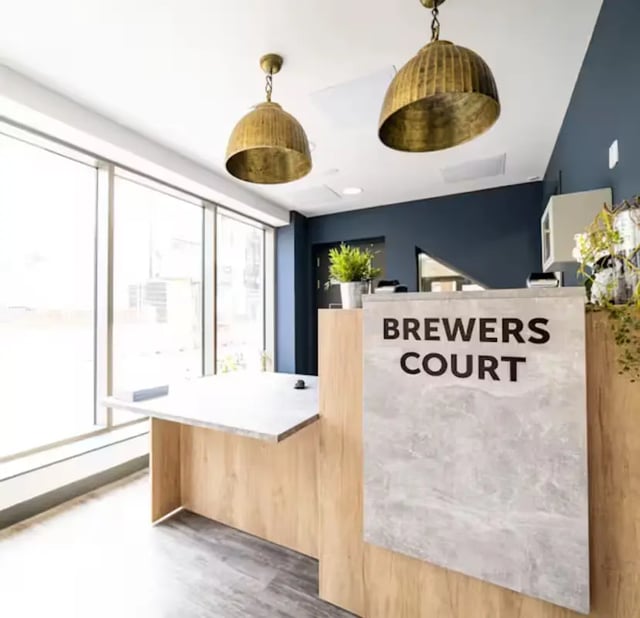 Reception desk with Brewers Court sign reception area at Brewer's Court in Edinburgh Student Accommodation