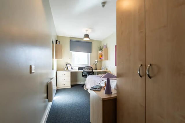 Bed desk wardrobe and shelves bedroom at The Heights in Birmingham Student Accommodation