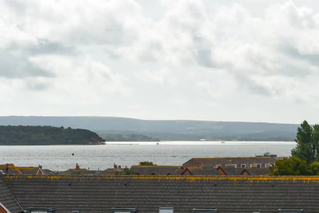 Waterfront view with rooftops and distant hills Exterior at Newcastle 1 in Newcastle Upon Tyne Student Accommodation