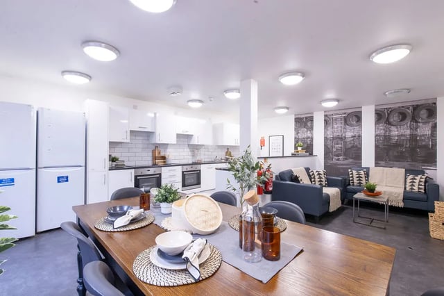 Kitchen dining area and living room with sofas at The Foundry Newcastle in Newcastle Upon Tyne Student Accommodation