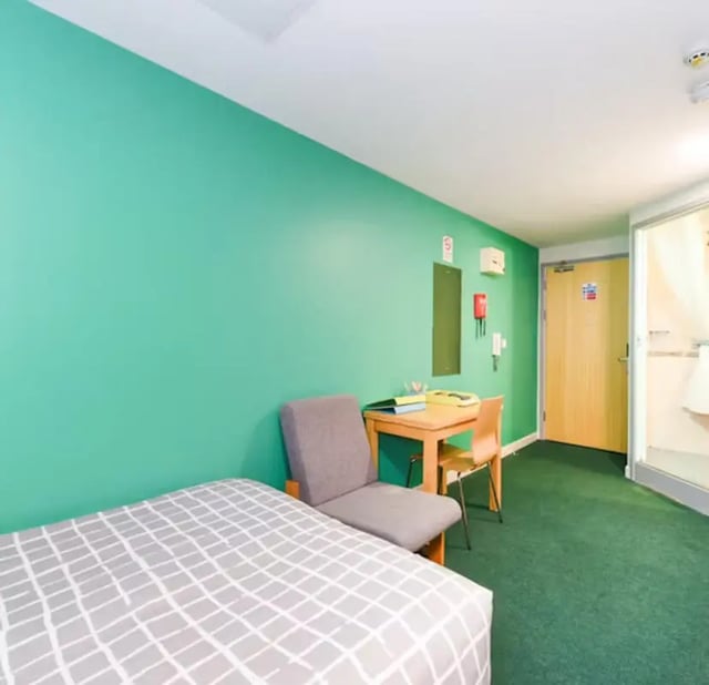 Bed desk chair and bathroom bedroom at Nottingham Two in Nottingham Student Accommodation
