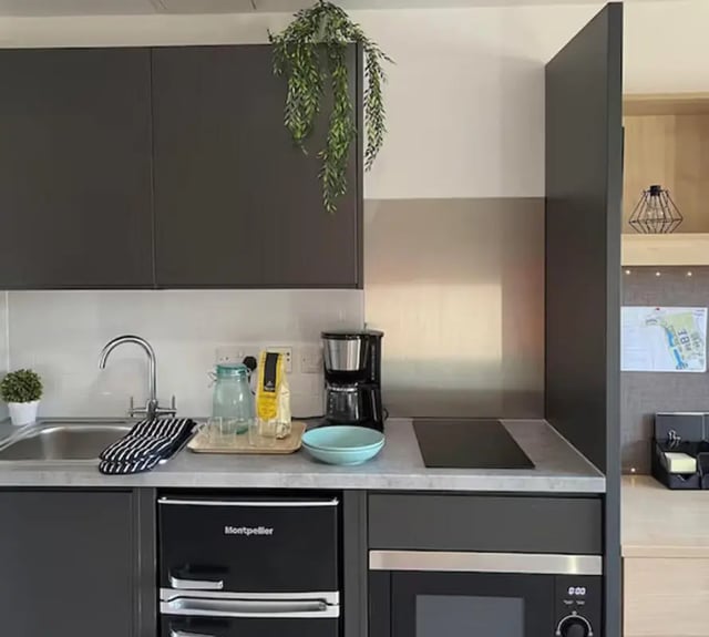 Modern kitchen with sink coffee maker microwave kitchen at Nottingham Two in Nottingham Student Accommodation
