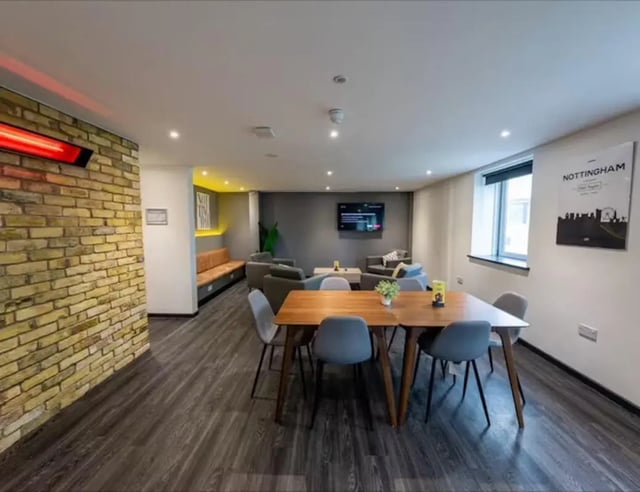 Dining table and chairs communal area living room at Trinity Square in Nottingham Student Accommodation