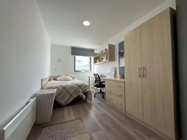 Bed desk wardrobe and radiator bedroom at Trinity Square in Nottingham Student Accommodation