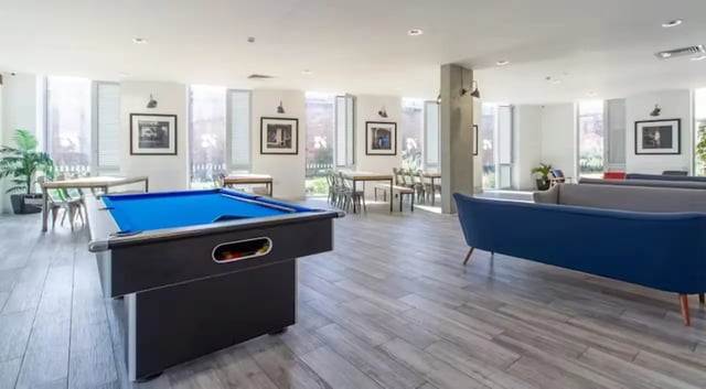 Pool table sofas tables chairs common room at The Union Leamington in Leamington Spa Student Accommodation