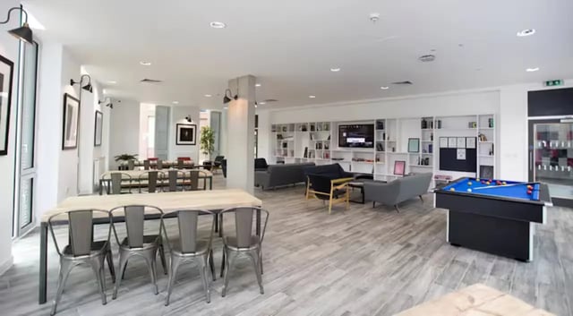 Dining tables sofas pool table common area at The Union Leamington in Leamington Spa Student Accommodation