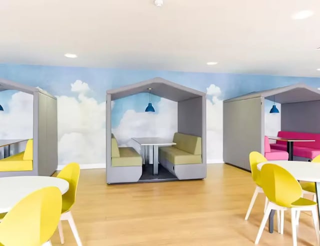 Study booths with green and pink seating communal area at Upperton Road in Leicester Student Accommodation