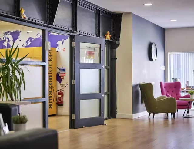 Amazon locker with fire extinguisher entryway living room at Upperton Road in Leicester Student Accommodation