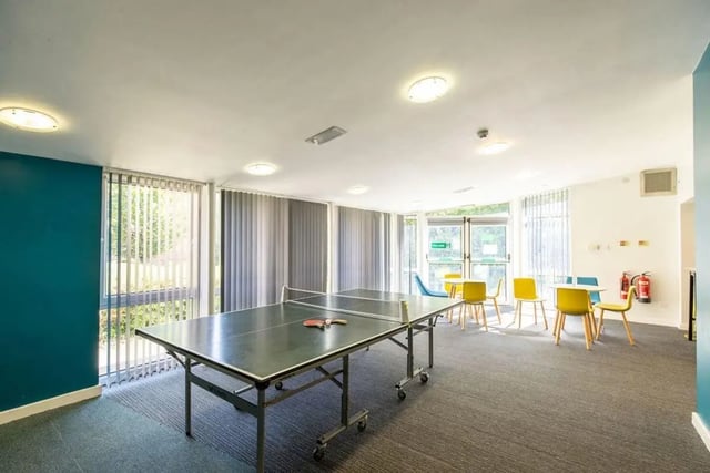 Ping pong table chairs fire extinguisher playing area at Charlotte Court in Sheffield Student Accommodation