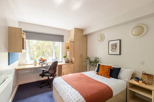 Bed desk and wardrobe student bedroom at Charlotte Court in Sheffield Student Accommodation