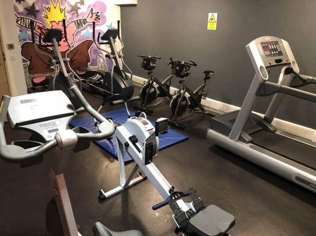 Treadmill rowing machine exercise bikes gym equipment fitness area at Horton House Bradford in Bradford Student Accommodation