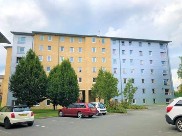 Multi-story building with yellow and blue sections exterior at Horton House Bradford in Bradford Student Accommodation