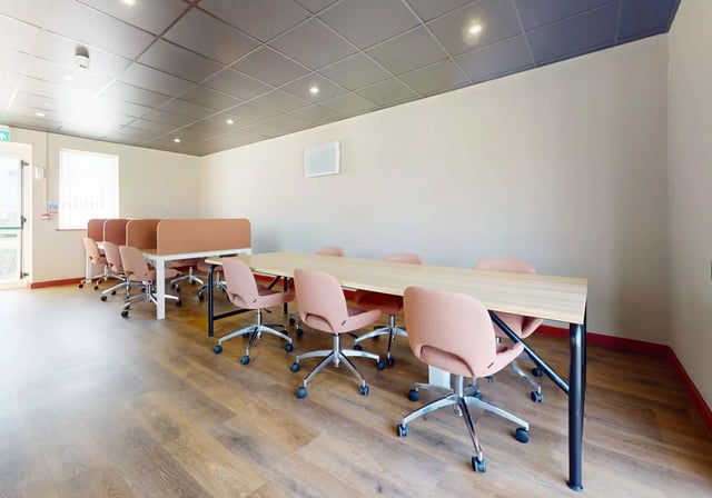 Desks with chairs and dividers study area at iQ Student Quarter in Salford Student Accommodation