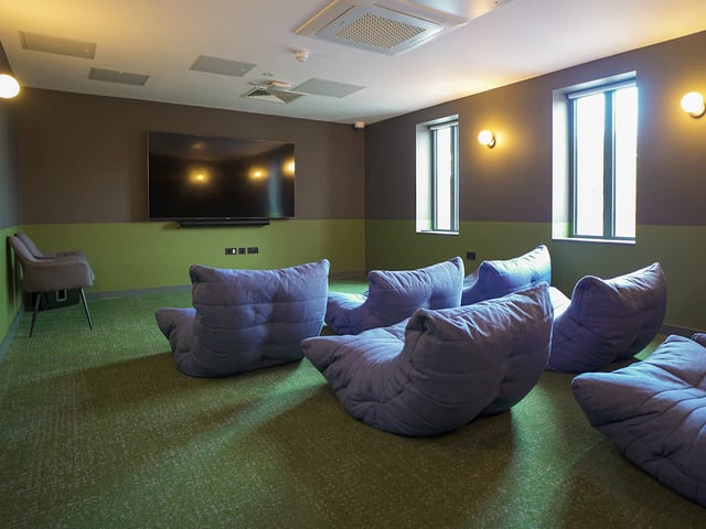 Beanbag chairs, large TV, lounge area at Straits Garden in Egham Student Accommodation