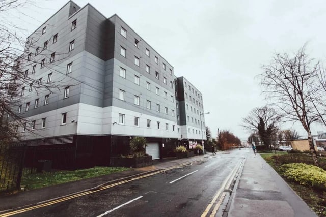 Modern grey apartment building with many windows exterior at Longside House Bradford in Bradford Student Accommodation
