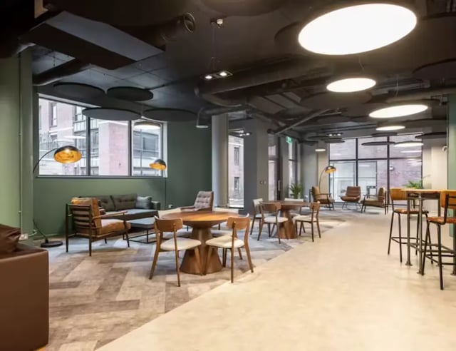 Modern lounge area with sofas tables and chairs lounge at Hollis Croft in Sheffield Student Accommodation