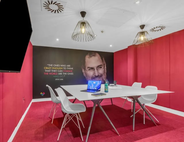 Steve Jobs mural laptop and chairs meeting room at The Glassworks - Leeds in Leeds Student Accommodation