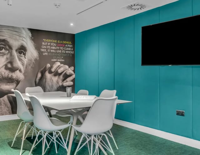 Einstein mural white chairs table meeting room at The Glassworks - Leeds in Leeds Student Accommodation