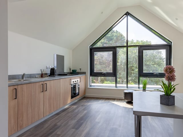 Kitchen cabinets oven sink kettle large window kitchen at Hill View Place in Exeter Student Accommodation