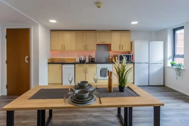 Kitchen with table and appliances kitchen at Central Place in Sheffield Student Accommodation