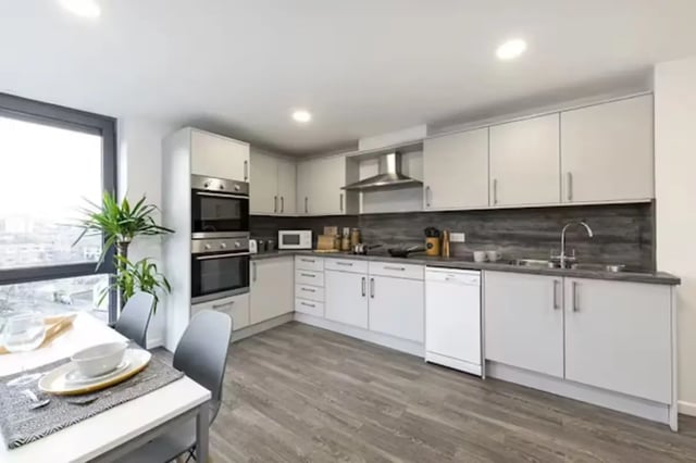Modern student kitchen with dining table kitchen at Central Place in Sheffield Student Accommodation