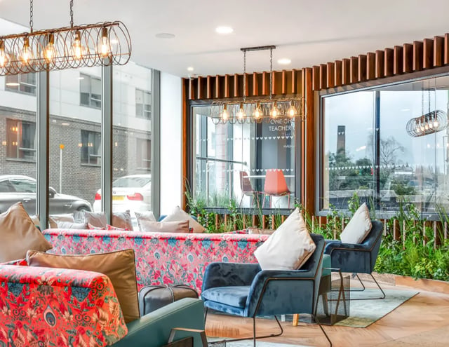 Comfortable seating with patterned sofas living room at The Edge - Leeds in Leeds Student Accommodation