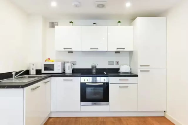 Modern white cabinets microwave kettle oven toaster kitchen at Mellor House - Central Place in Sheffield Student Accommodation