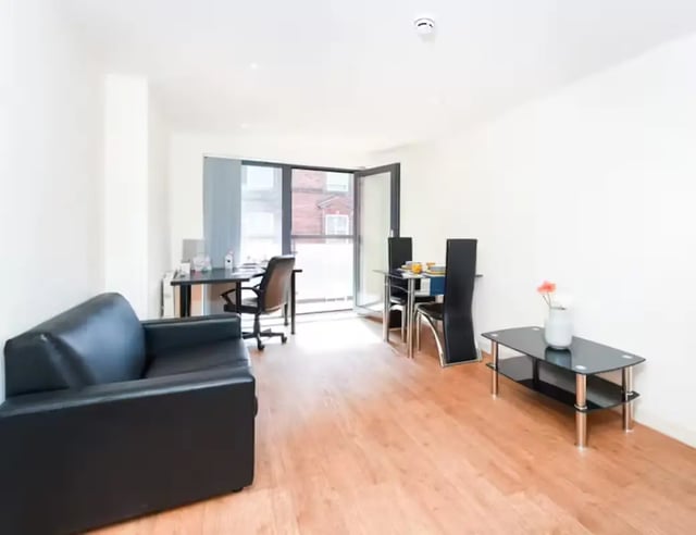 Sofa desk dining table coffee table living room at Mellor House - Central Place in Sheffield Student Accommodation