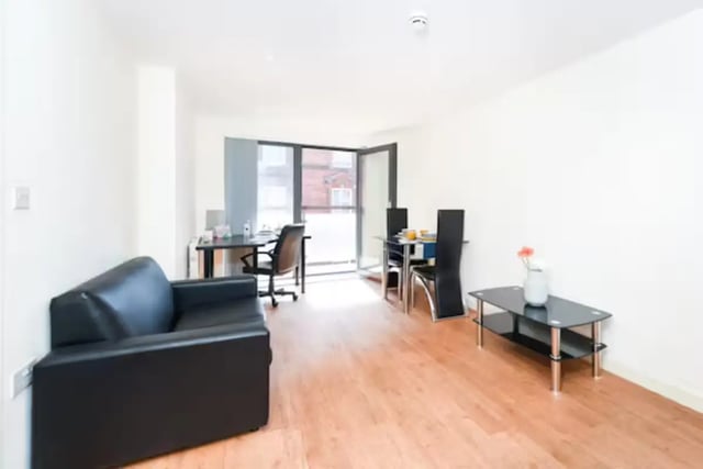 Black sofa desk dining set coffee table living room at Mellor House - Central Place in Sheffield Student Accommodation