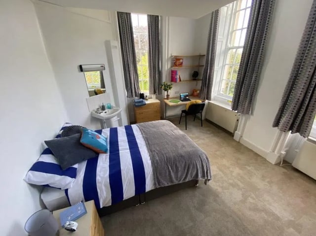 Bed sink desk and chair bedroom at St Mary's Newcastle in Newcastle Upon Tyne Student Accommodation