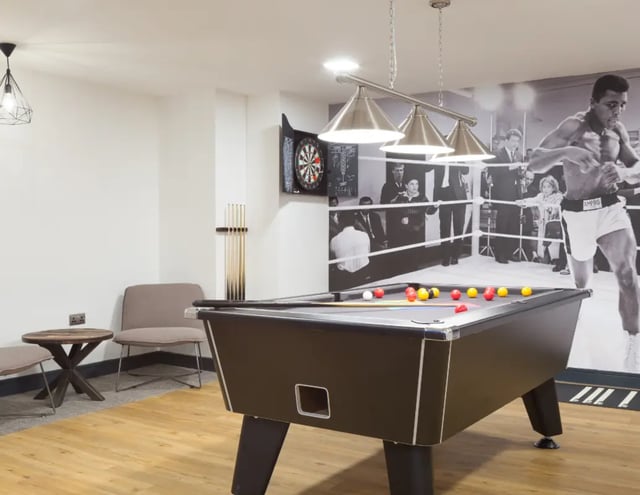 Pool table darts and boxing mural common area at The Ascent in Liverpool Student Accommodation