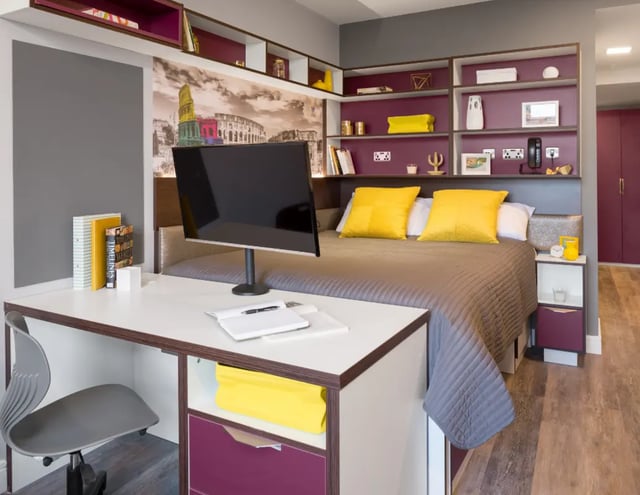 Desk bed monitor books shelves bedroom at The Ascent in Liverpool Student Accommodation