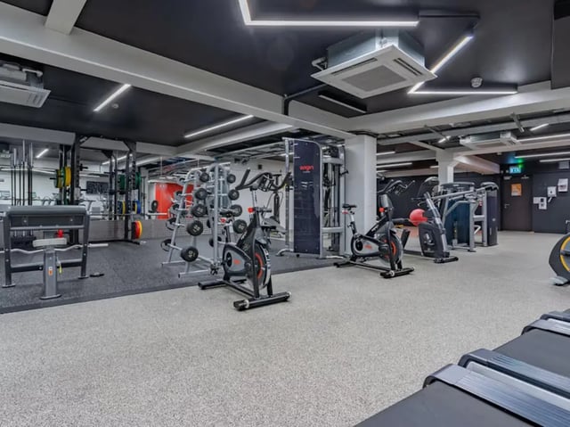Weight racks spin bikes treadmills gym equipment gym at Powis Place in Aberdeen Student Accommodation