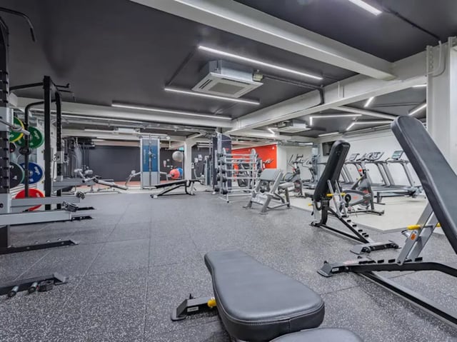 Gym equipment with treadmills and benches gym at Powis Place in Aberdeen Student Accommodation