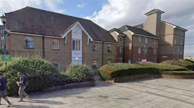 Brick building with arched windows exterior at Rochester Student Village in Rochester Student Accommodation