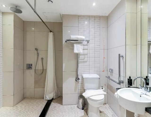 Accessible shower toilet sink towels bathroom at IconInc Manchester City in Manchester Student Accommodation