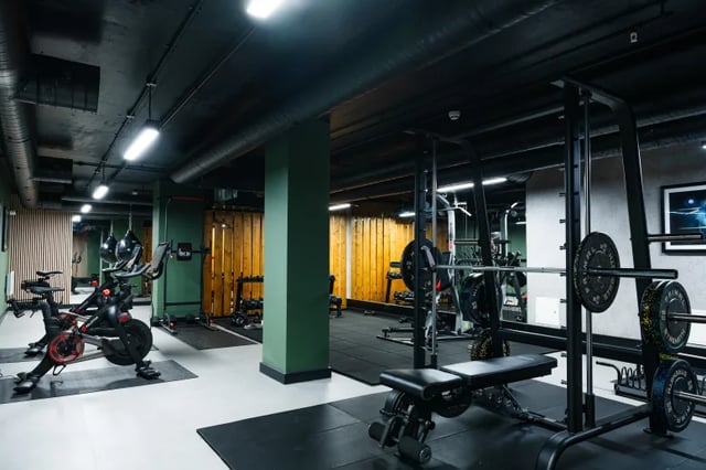 Weightlifting equipment exercise bikes and punch bags gym at Boutique Student Living Swansea in Swansea Student Accommodation
