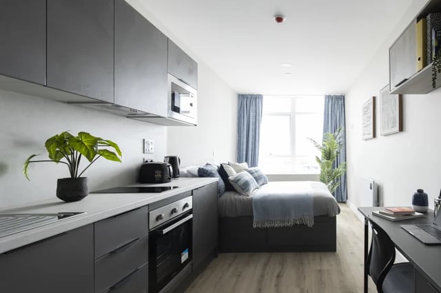 Kitchen bed and desk student studio room at Boutique Student Living Swansea in Swansea Student Accommodation