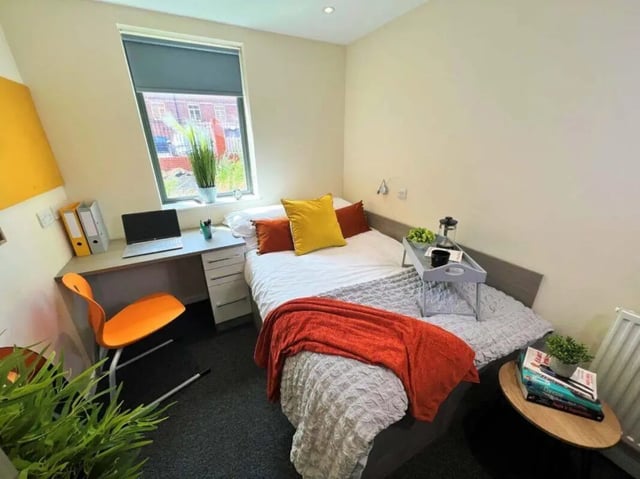 Bed desk chair and laptop student bedroom at Stratus in Sheffield Student Accommodation