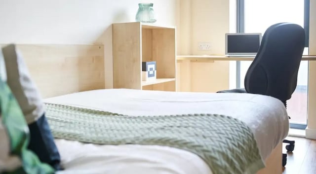 Bed desk chair laptop shelves bedroom study area at Rockingham House in Sheffield Student Accommodation