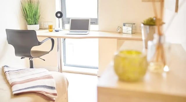 Desk laptop chair and blanket study area at Rockingham House in Sheffield Student Accommodation