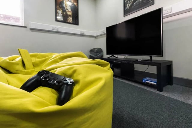 Yellow beanbag PlayStation controller television gaming area at Stoke Student Village in Stoke-On-Trent Student Accommodation