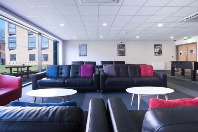 Sofas tables foosball table common area at Stoke Student Village in Stoke-On-Trent Student Accommodation