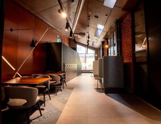 Modern seating and tables communal area at IconInc Newcastle City in Newcastle Upon Tyne Student Accommodation