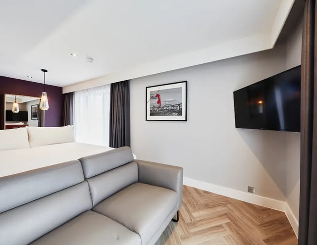 Bed sofa picture and TV bedroom living room at IconInc Newcastle City in Newcastle Upon Tyne Student Accommodation