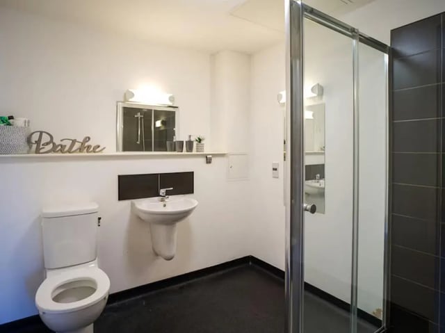 Toilet sink and shower enclosure bathroom at Exeter One in Exeter Student Accommodation