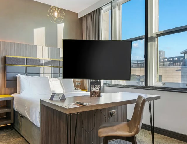 Bed desk TV and chair bedroom at Manchester Victoria in Manchester Student Accommodation